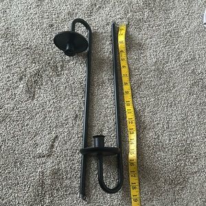 Set of black metal wall taper candle holders